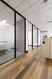 Concept commercial interiors Office Fitout hallway timber floor